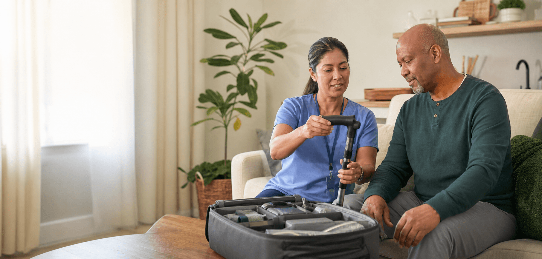 A home-health clinician helping a patient understand newly delivered mobility equipment